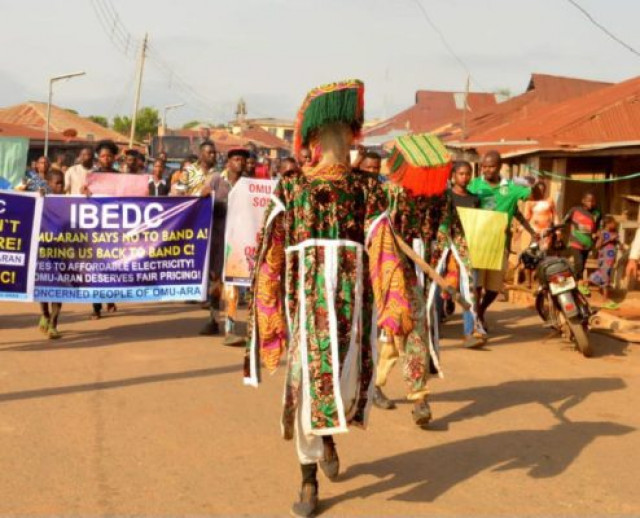 Two masquerades lead protest in kwara state